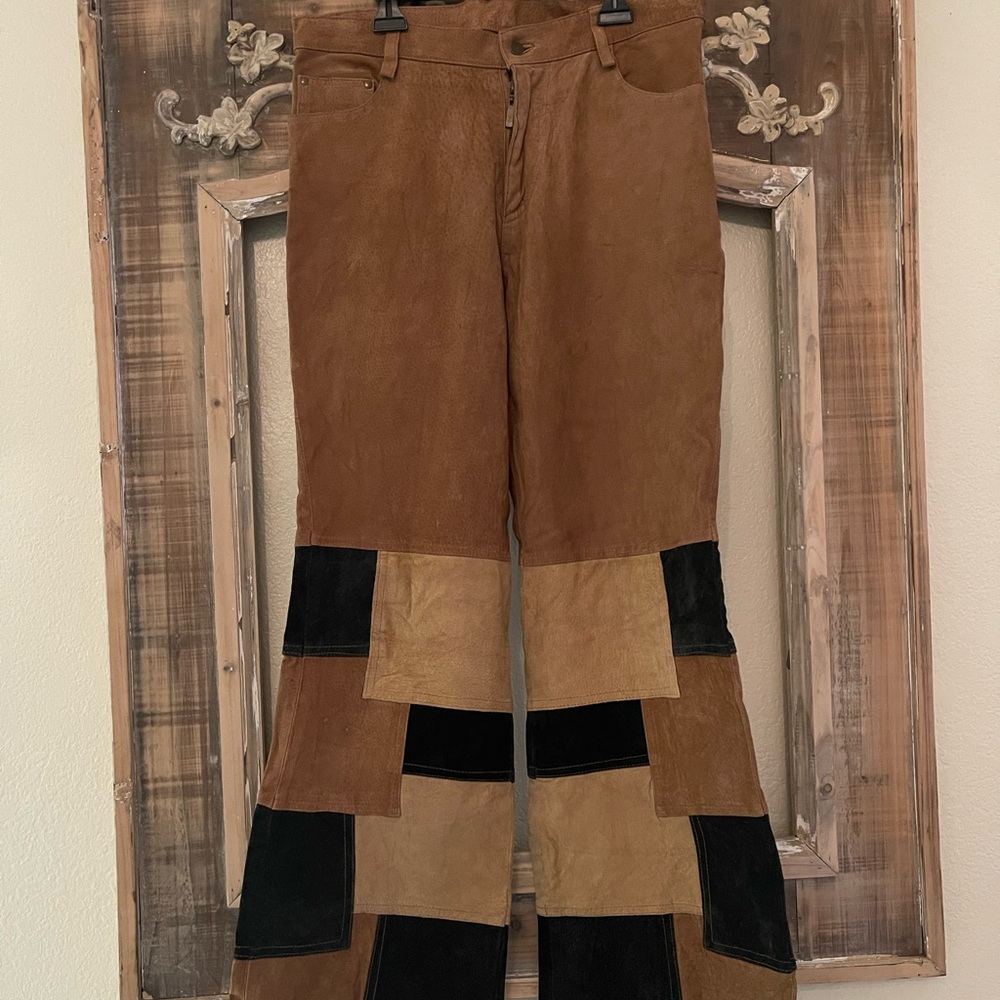 Leather pants with color block on the ends.